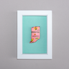 Framed artwork of a pink map of Indiana on a teal background